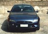 by Luciano - iscritto n.161 > Ford Puma 1.4 16v del 12.1998 color blu, palpebre fari, scarico ovale SuperSprint, filtro aria K&N, candele modificate, cerchi lega OZ F1, fari fendinebbia artigianali rotondi in mascherina anteriore, pedaliere Momo-Corse, battitacco artigianale, spoiler posteriore con terzo stop a led...